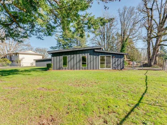 view of outbuilding with fence