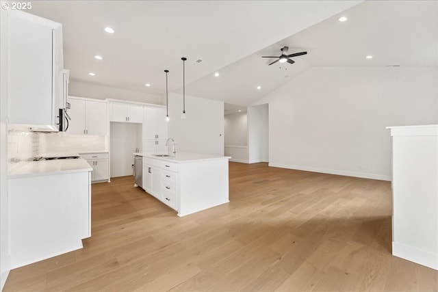 737 SE Forest Glen Rd, Estacada, OR 97023 - kitchen featuring recessed lighting, stainless steel appliances, backsplash, a sink, and light wood-style floors