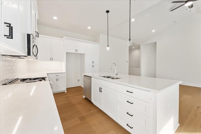 737 SE Forest Glen Rd, Estacada, OR 97023 - kitchen featuring stainless steel dishwasher, a sink, ceiling fan, light wood-style flooring, and visible vents