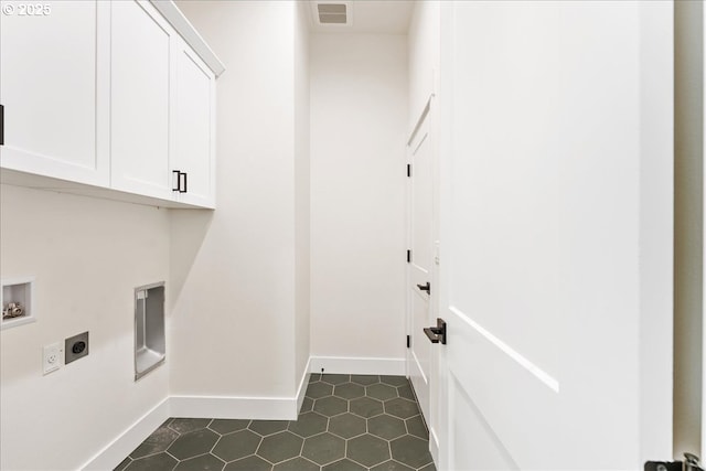 737 SE Forest Glen Rd, Estacada, OR 97023 - washroom featuring hookup for an electric dryer, visible vents, baseboards, hookup for a washing machine, and cabinet space