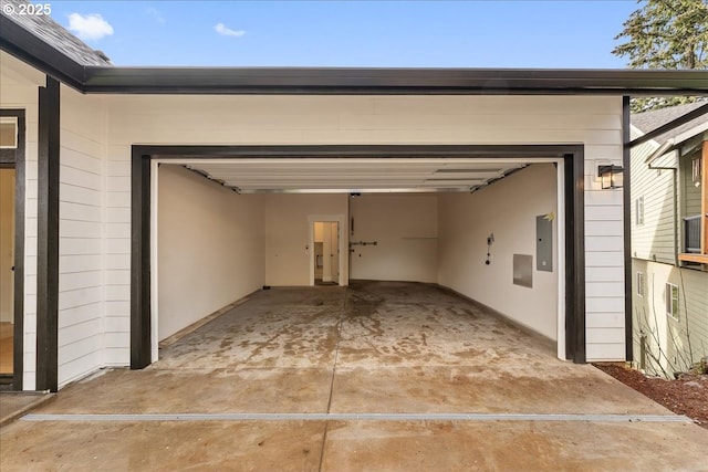 737 SE Forest Glen Rd, Estacada, OR 97023 - garage featuring electric panel and concrete driveway