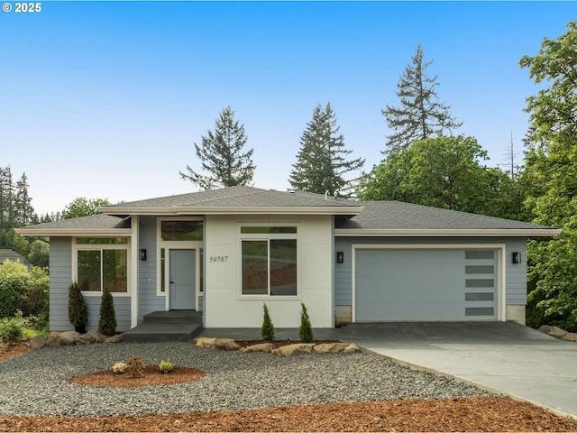 59787 Kimmell Ln, Saint Helens, OR 97051 - prairie-style house featuring a garage, driveway, and a shingled roof