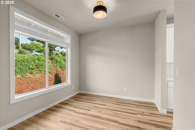 59787 Kimmell Ln, Saint Helens, OR 97051 - unfurnished room with light wood-style floors and baseboards