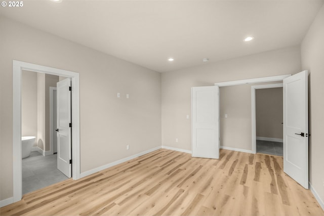 59787 Kimmell Ln, Saint Helens, OR 97051 - unfurnished bedroom with light wood finished floors, recessed lighting, baseboards, and ensuite bath