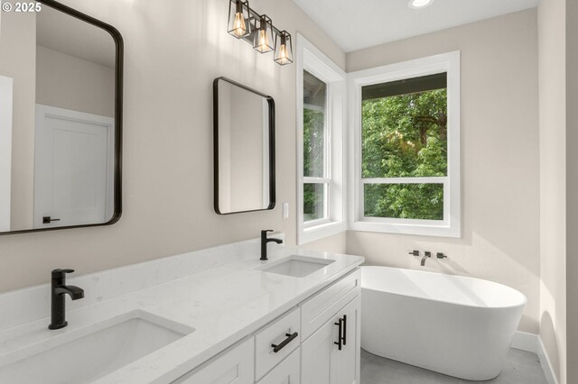 59787 Kimmell Ln, Saint Helens, OR 97051 - bathroom with a freestanding bath, double vanity, and recessed lighting