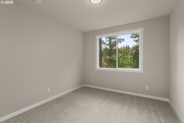 59787 Kimmell Ln, Saint Helens, OR 97051 - carpeted spare room with baseboards