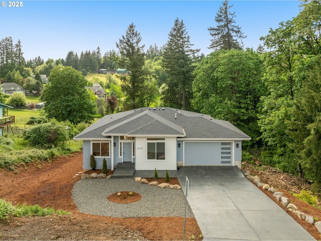 59787 Kimmell Ln, Saint Helens, OR 97051 - view of front of house with driveway, an attached garage, and a shingled roof