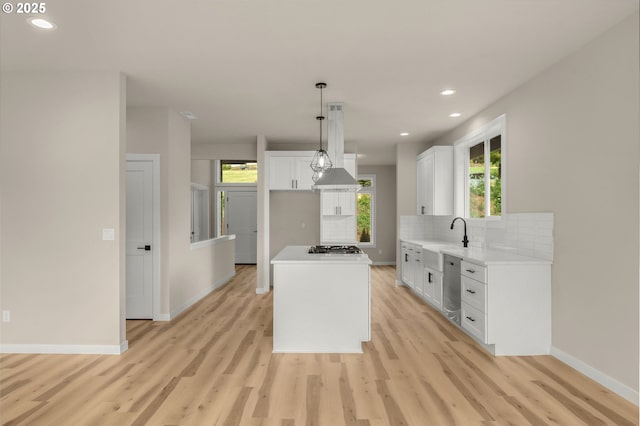 59787 Kimmell Ln, Saint Helens, OR 97051 - kitchen with a sink, light wood-style floors, white cabinetry, and recessed lighting
