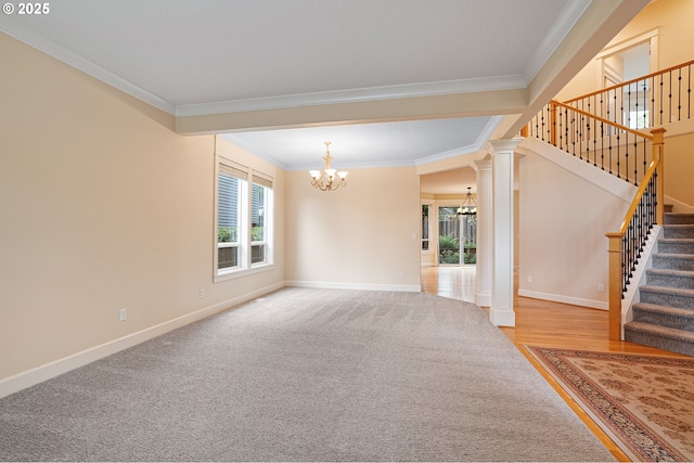 3578 NW Gerritz Ter, Portland, OR 97229 - unfurnished living room featuring a chandelier, crown molding, healthy amount of natural light, stairway, and baseboards