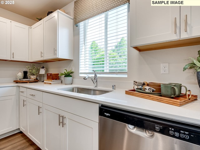 5511 NE 66th Pl, Vancouver, WA 98661 - kitchen featuring stainless steel appliances, a sink, light countertops, white cabinetry, and recessed lighting