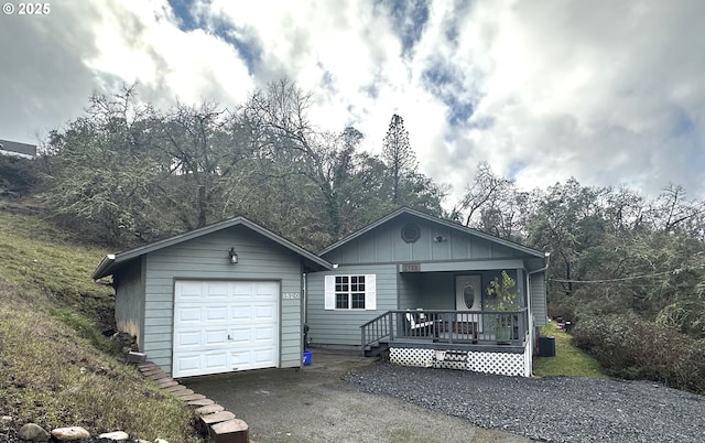 view of front of house with central AC unit and a porch