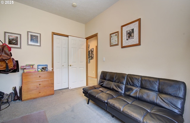 living area with carpet