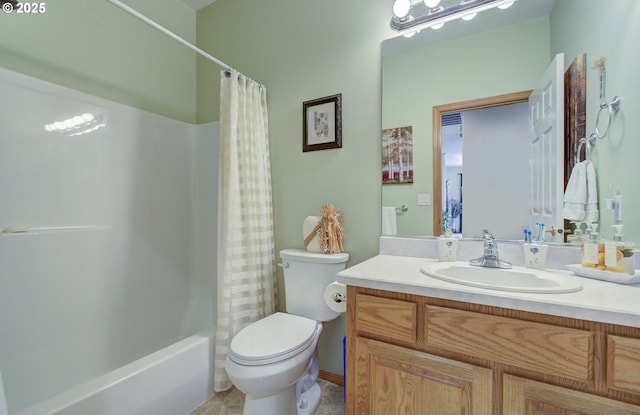full bathroom featuring toilet, vanity, and shower / bath combo with shower curtain