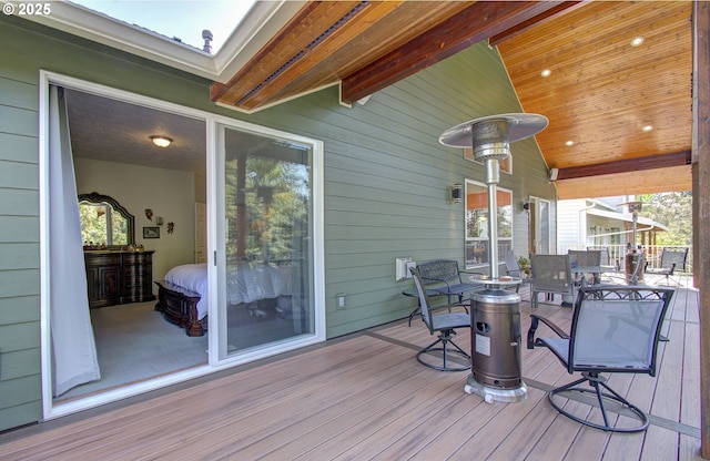 deck with outdoor dining area