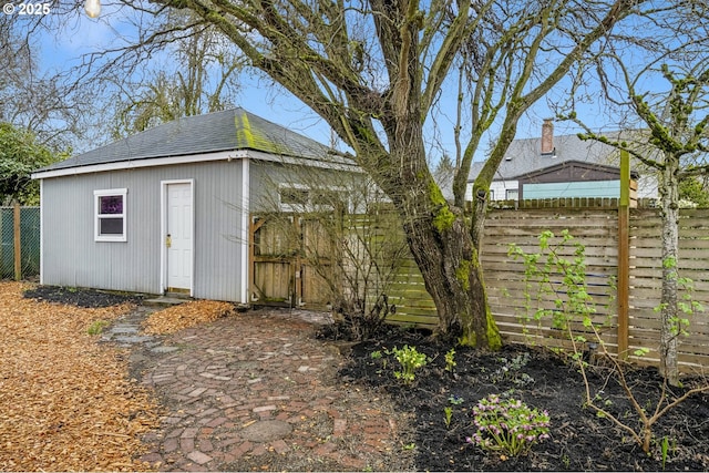 view of outbuilding featuring an outbuilding and a fenced backyard