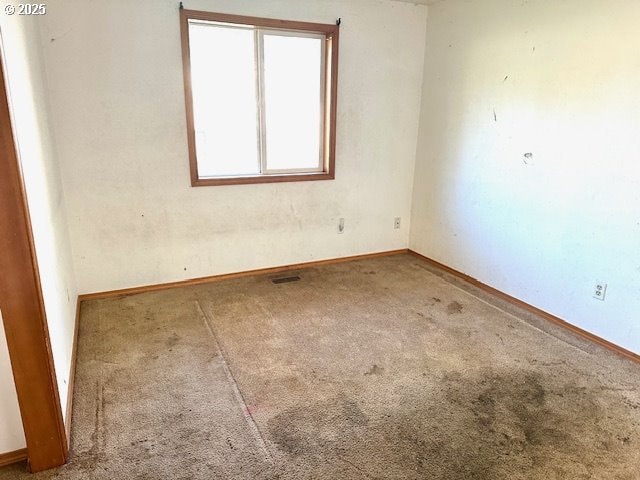 empty room featuring carpet