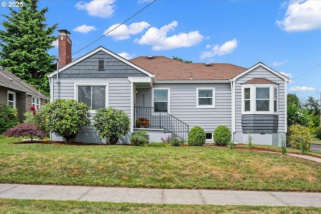 6955 N Concord Ave, Portland, OR 97217 - bungalow with a front yard and a chimney