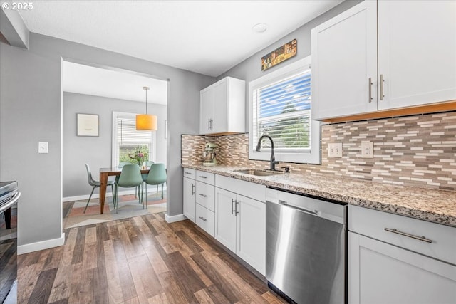 6955 N Concord Ave, Portland, OR 97217 - kitchen featuring dishwasher, a sink, dark wood-style flooring, and healthy amount of natural light