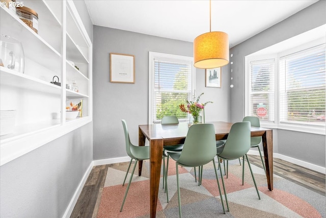 6955 N Concord Ave, Portland, OR 97217 - dining room with wood finished floors and baseboards