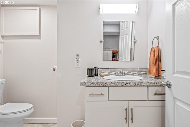 6955 N Concord Ave, Portland, OR 97217 - half bathroom with vanity and toilet
