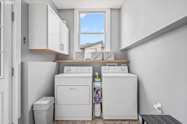 6955 N Concord Ave, Portland, OR 97217 - laundry area featuring cabinet space and washer and clothes dryer