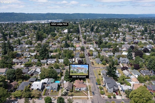 6955 N Concord Ave, Portland, OR 97217 - aerial view of property and surrounding area featuring nearby suburban area and property boundaries highlighted