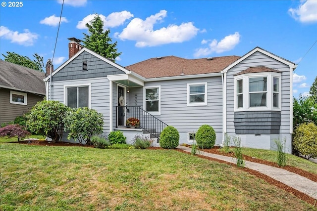 6955 N Concord Ave, Portland, OR 97217 - bungalow-style house with a front lawn and a chimney