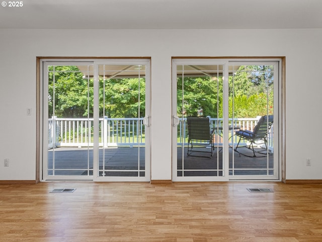 3123 SE 129th Ave, Portland, OR 97236 - empty room with light wood-style flooring