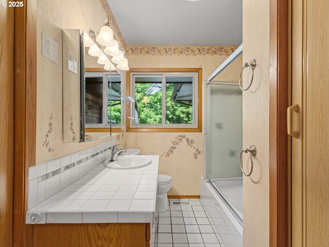 3123 SE 129th Ave, Portland, OR 97236 - bathroom with vanity, tile patterned flooring, enclosed tub / shower combo, and wallpapered walls