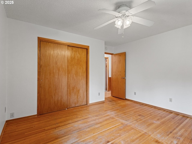 3123 SE 129th Ave, Portland, OR 97236 - unfurnished bedroom with light wood-type flooring, a closet, and a ceiling fan