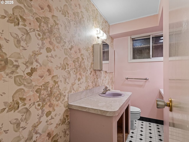 3123 SE 129th Ave, Portland, OR 97236 - half bathroom featuring wallpapered walls, vanity, crown molding, and tile patterned floors