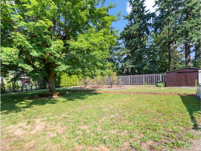 3123 SE 129th Ave, Portland, OR 97236 - view of yard with a shed and view of wooded area