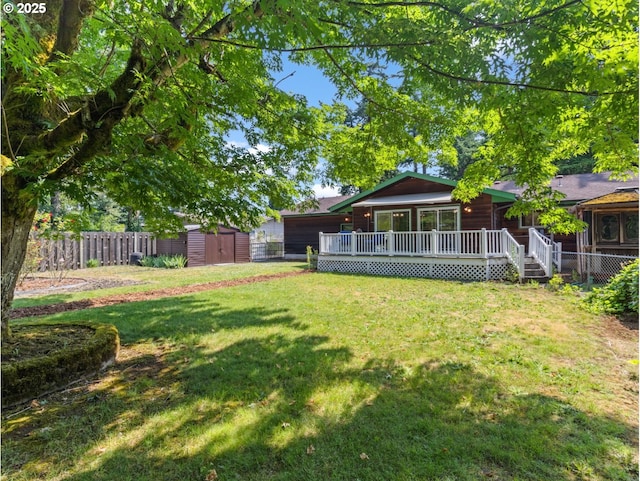 3123 SE 129th Ave, Portland, OR 97236 - view of yard with a storage unit and a wooden deck