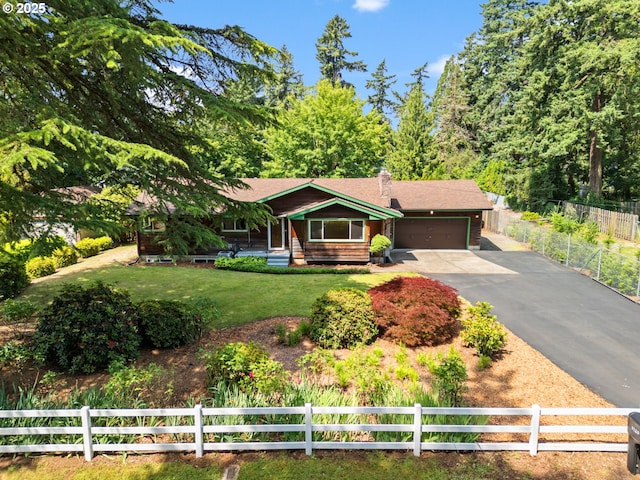 3123 SE 129th Ave, Portland, OR 97236 - view of front of home featuring an attached garage and asphalt driveway