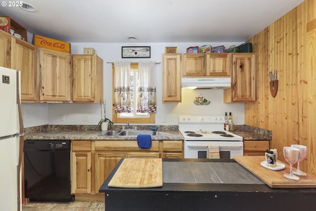 kitchen featuring white appliances, wooden walls, and sink