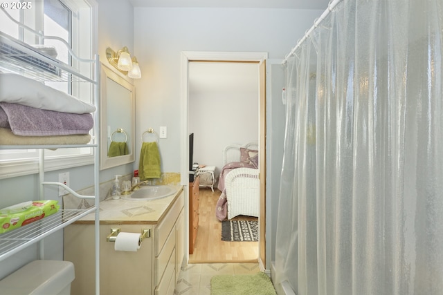 bathroom with vanity and tile patterned floors