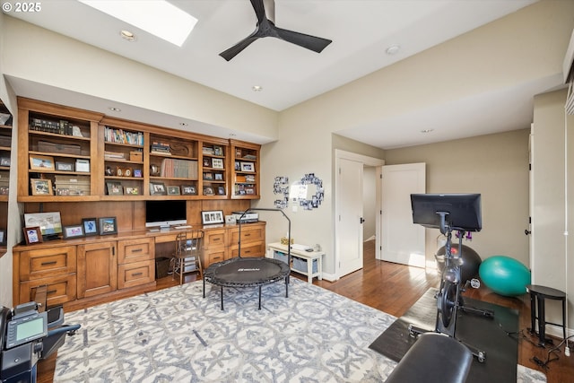 2550 Dellwood Dr, Lake Oswego, OR 97034 - home office with a ceiling fan, wood finished floors, built in study area, baseboards, and recessed lighting
