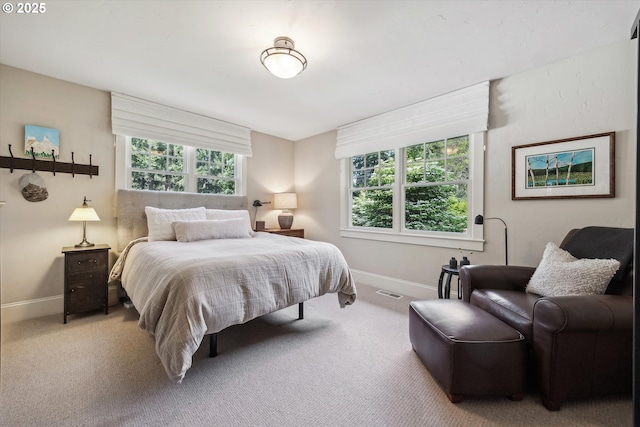 2550 Dellwood Dr, Lake Oswego, OR 97034 - carpeted bedroom with baseboards and multiple windows