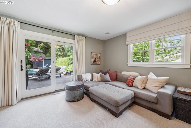 2550 Dellwood Dr, Lake Oswego, OR 97034 - living room featuring healthy amount of natural light and light carpet