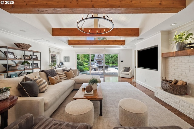 2550 Dellwood Dr, Lake Oswego, OR 97034 - living room with beamed ceiling, healthy amount of natural light, wood finished floors, and a chandelier