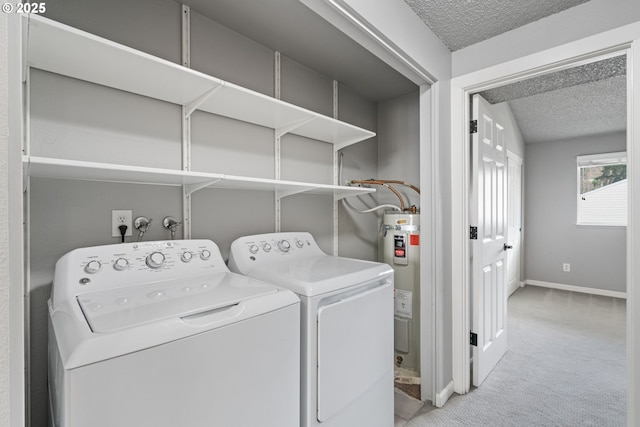 13216 NE Salmon Creek Ave Unit E8, Vancouver, WA 98686 - laundry area with a textured ceiling, light colored carpet, baseboards, independent washer and dryer, and water heater