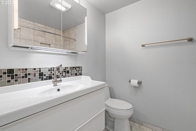 13216 NE Salmon Creek Ave Unit E8, Vancouver, WA 98686 - bathroom featuring decorative backsplash, vanity, and toilet