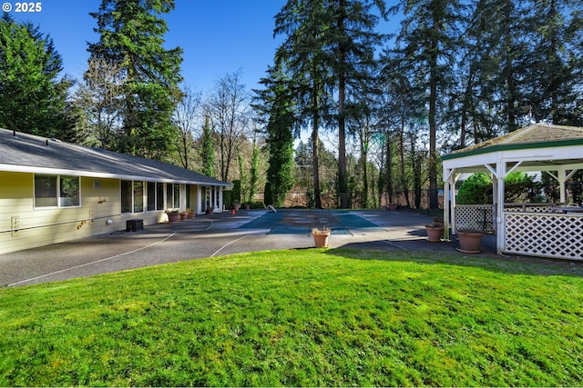 13216 NE Salmon Creek Ave Unit E8, Vancouver, WA 98686 - view of grassy yard featuring a gazebo
