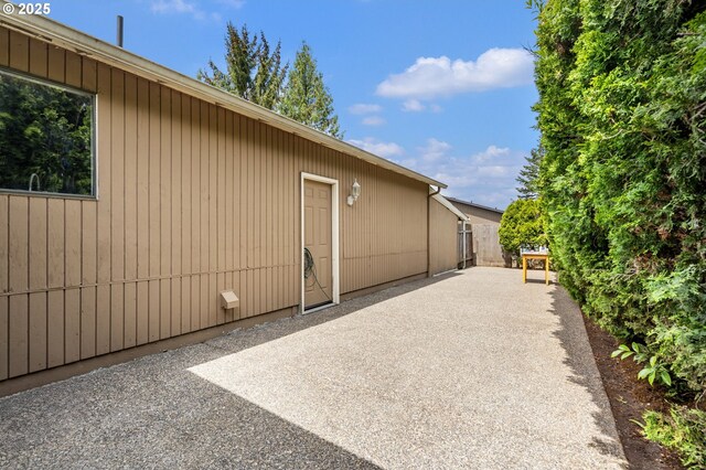 view of property exterior featuring a patio