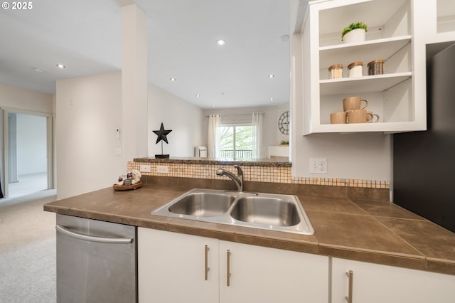 10664 NE Holly St # 206, Hillsboro, OR 97006 - kitchen featuring dark countertops, stainless steel dishwasher, white cabinets, carpet floors, and open shelves
