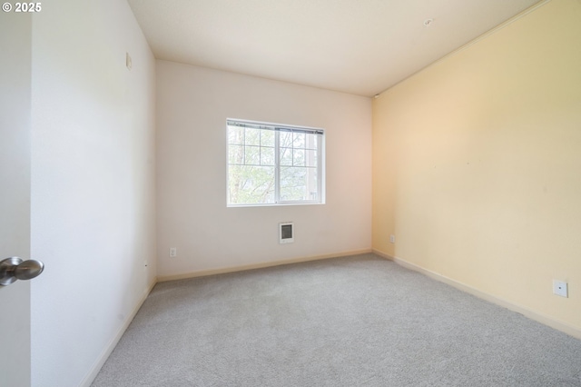 10664 NE Holly St # 206, Hillsboro, OR 97006 - empty room with light colored carpet and heating unit