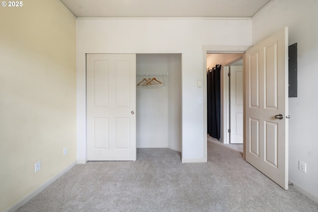 10664 NE Holly St # 206, Hillsboro, OR 97006 - unfurnished bedroom featuring carpet flooring, a closet, ornamental molding, and electric panel