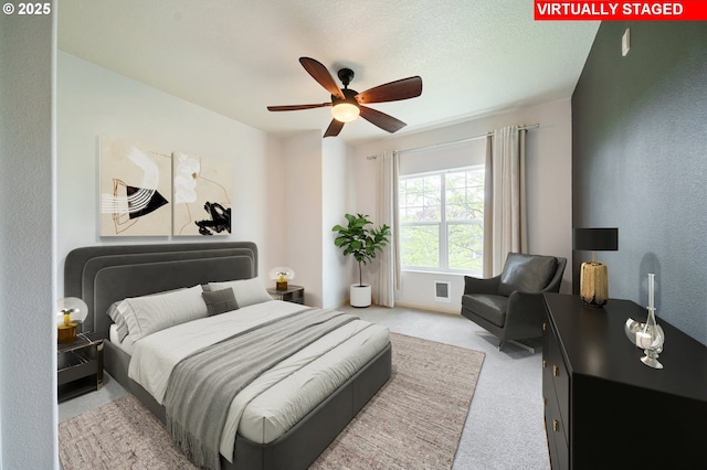 10664 NE Holly St # 206, Hillsboro, OR 97006 - carpeted bedroom with ceiling fan