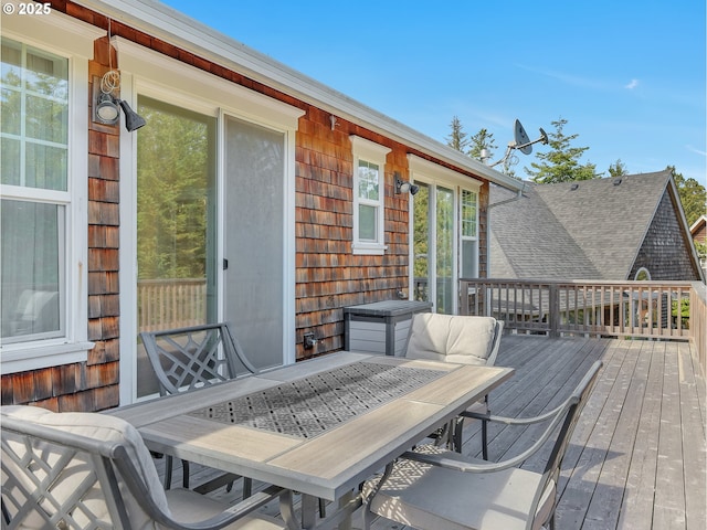 10305 Pine Ridge Dr, Manzanita, OR 97130 - wooden deck featuring outdoor dining space