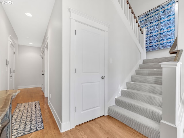 10305 Pine Ridge Dr, Manzanita, OR 97130 - stairway featuring wood finished floors and recessed lighting